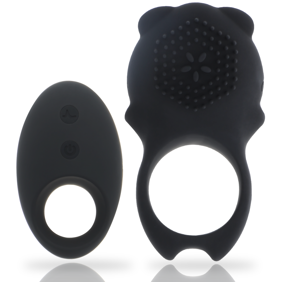 Anel Peniano Vibratório MIA Colosseo: Dispositivo de casal premium em silicone preto ao lado do seu comando à distância compacto.