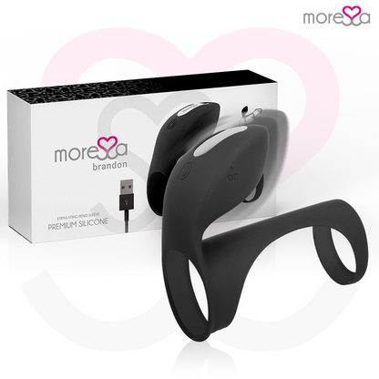 Anel Peniano Vibratório Moressa Brandon: Estimulador de casal em silicone preto com capa alongada e nervuras em relevo.
