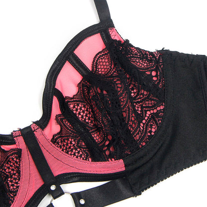 Conjunto Subblime Verde e Rosa: Sutiã estruturado em pele verde com fecho frontal e cueca em mesh rosa. Diamora