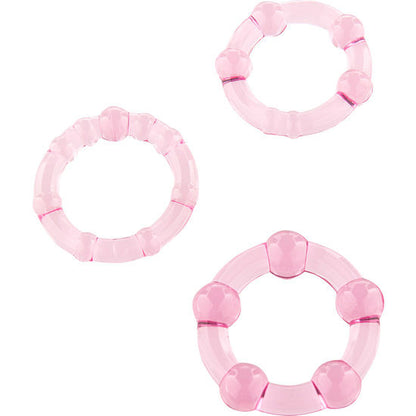 Conjunto Triple Loop Seven Creations: Os três anéis penianos em silicone rosa exibidos lado a lado em perspetiva de tamanhos progressivos.