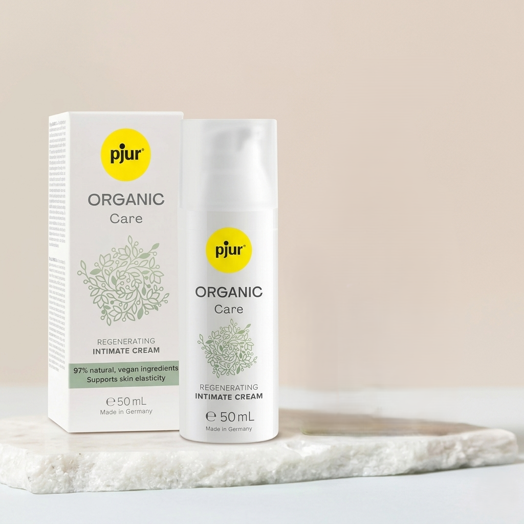 Creme Íntimo pjur Organic Care: Vista frontal da sofisticada embalagem branca de 50 ml com linhas verdes minimalistas, transmitindo o caráter de um cosmético clínico de farmácia premium e cariz natural. Diamora