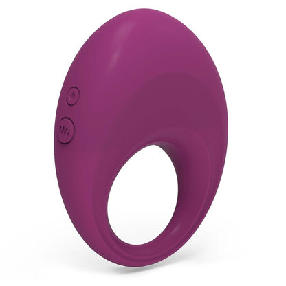Ergonomia do Silicone: Detalhe macro da aba superior texturizada do anel, projetada para a estimulação clitoridiana sincronizada.