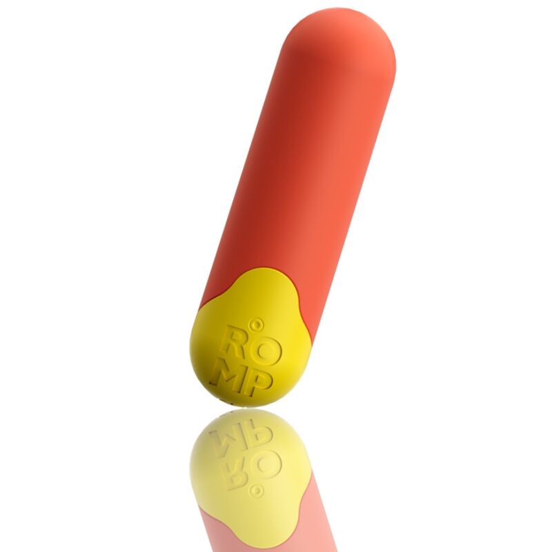 Estrutura Modular Desmontada: Foco que demonstra a mini-bala vibratória laranja a ser retirada do interior da capa elástica de silicone amarela, evidenciando a versatilidade do produto.