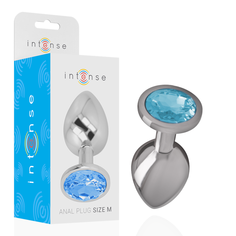Joia Anal Intense com Cristal Azul M: Fotografia de estúdio com iluminação premium em fundo escuro, focando no plug anal de alumínio polido de tamanho M, exibindo o reflexo espelhado do metal e o cristal azul brilhante na base.