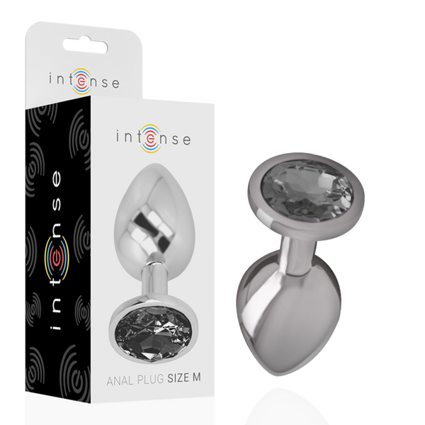 Joia Anal Intense com Cristal Preto M: Fotografia de estúdio com iluminação premium em fundo escuro, focando no plug anal de alumínio polido de tamanho M, exibindo o reflexo espelhado do metal e o cristal negro facetado na base.