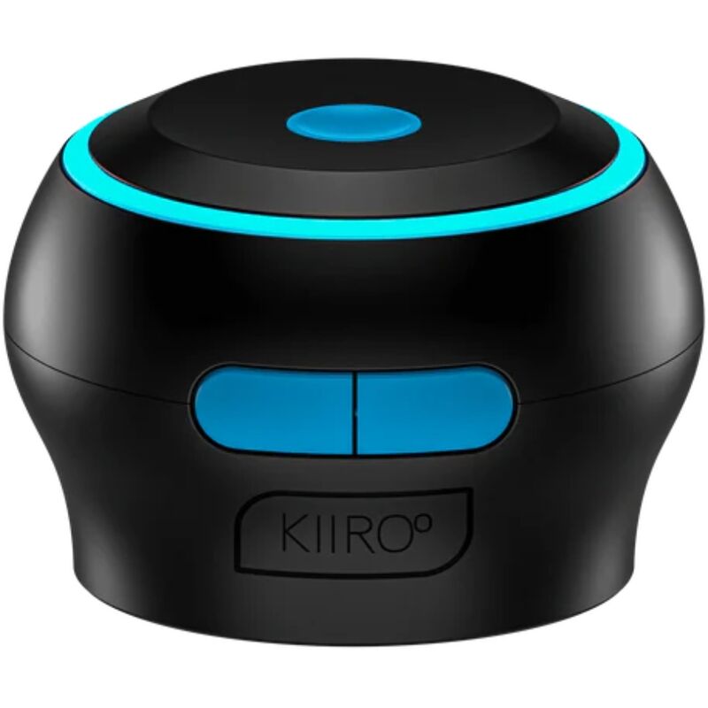 Kiiroo Controle Interativo Preto: Fotografia editorial focando no design minimalista, moderno e na ergonomia do dispositivo.