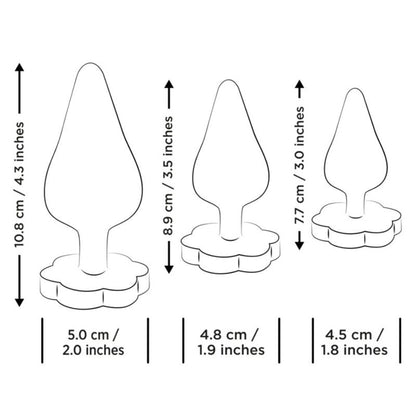 Kit de Treino ROMP Luster: Os três plugs analógicos pretos alinhados por ordem crescente de tamanho, destacando o design elegante e o acabamento mate. Diamora