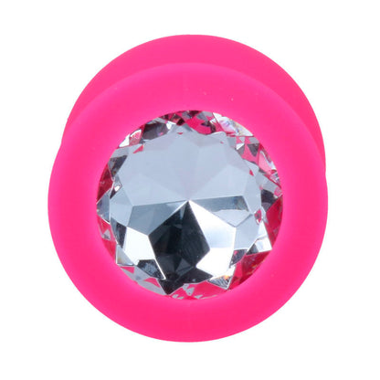 Plug Anal de Silicone Intense Shelki L Fúcsia: Fotografia premium de estúdio exibindo o plug anal de tamanho L em tom fúcsia mate, realçando a sua silhueta cónica progressiva, acabamento aveludado e base ergonómica estável. Diamora
