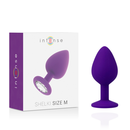 Plug Anal de Silicone Intense Shelki M Lilás: Fotografia premium de estúdio exibindo o plug anal de tamanho M em tom lilás mate, realçando a sua silhueta cónica suave, acabamento aveludado e base ergonómica estável.