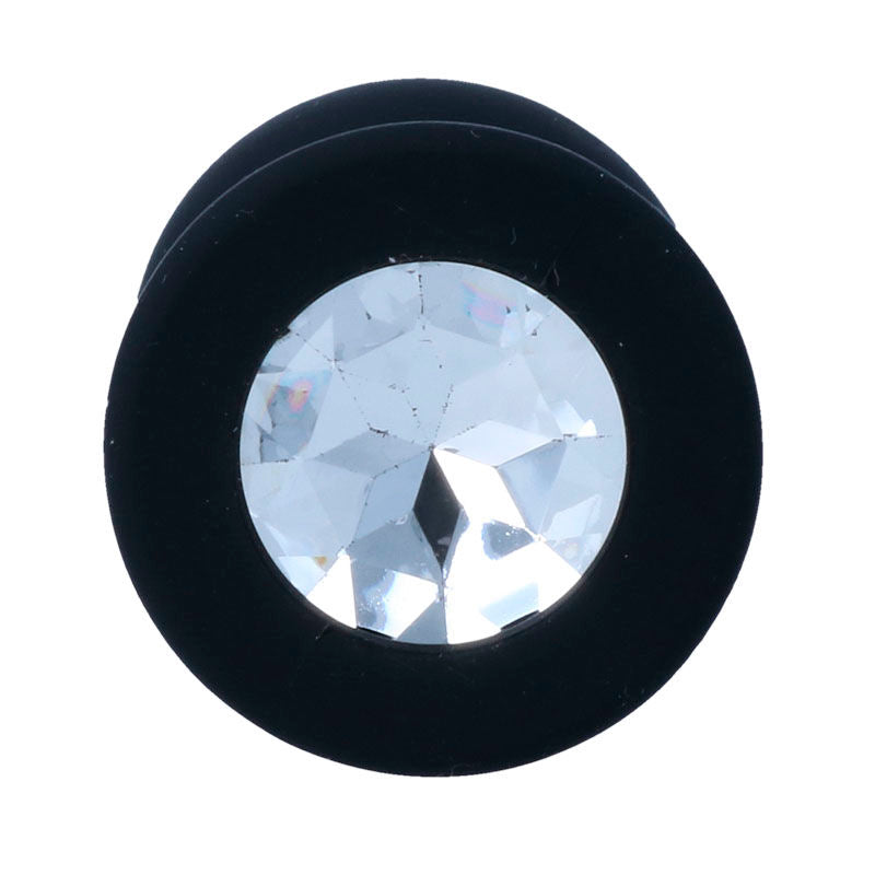 Silicone de Grau Médico Hipoalergénico: Plano detalhado focando na flexibilidade e na derme totalmente lisa e não porosa do plug, destacando a barreira contra germes e o toque sedoso.