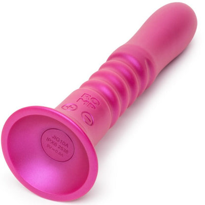 Vibrador ROMP Jiggle: Estimulador com movimento de translação mecânica em silicone rosa, exibido fixado horizontalmente pela sua ventosa. Diamora